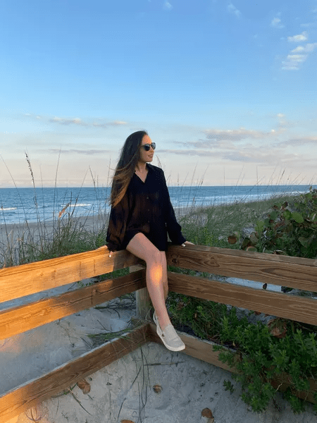 woman sitting on the beach